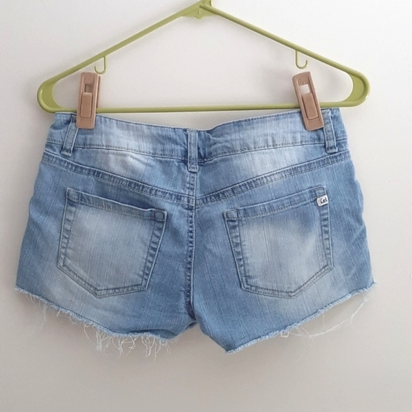 Lowrise cutoff jean shorts with floral detailing - Picture 2 of 4